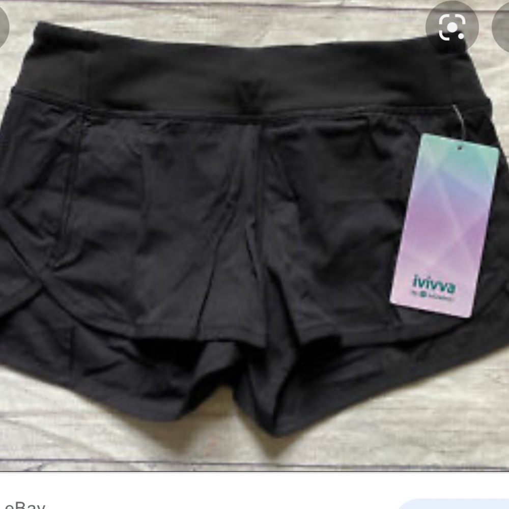 black ivivva speed up shorts size 10!
